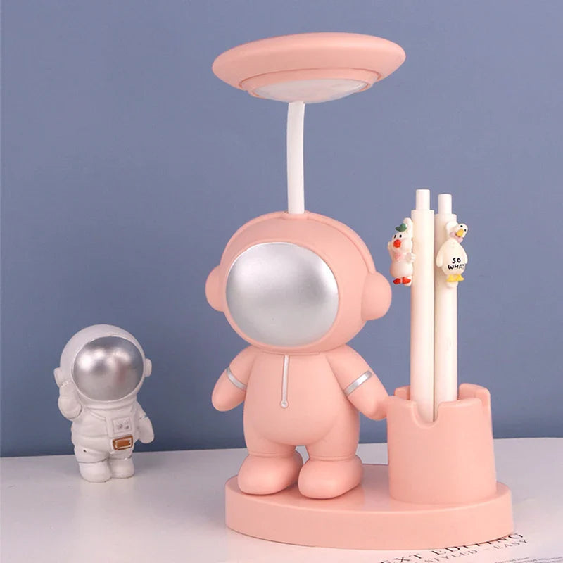 SpaceExplorer - Roztomilá stolová lampa astronauta